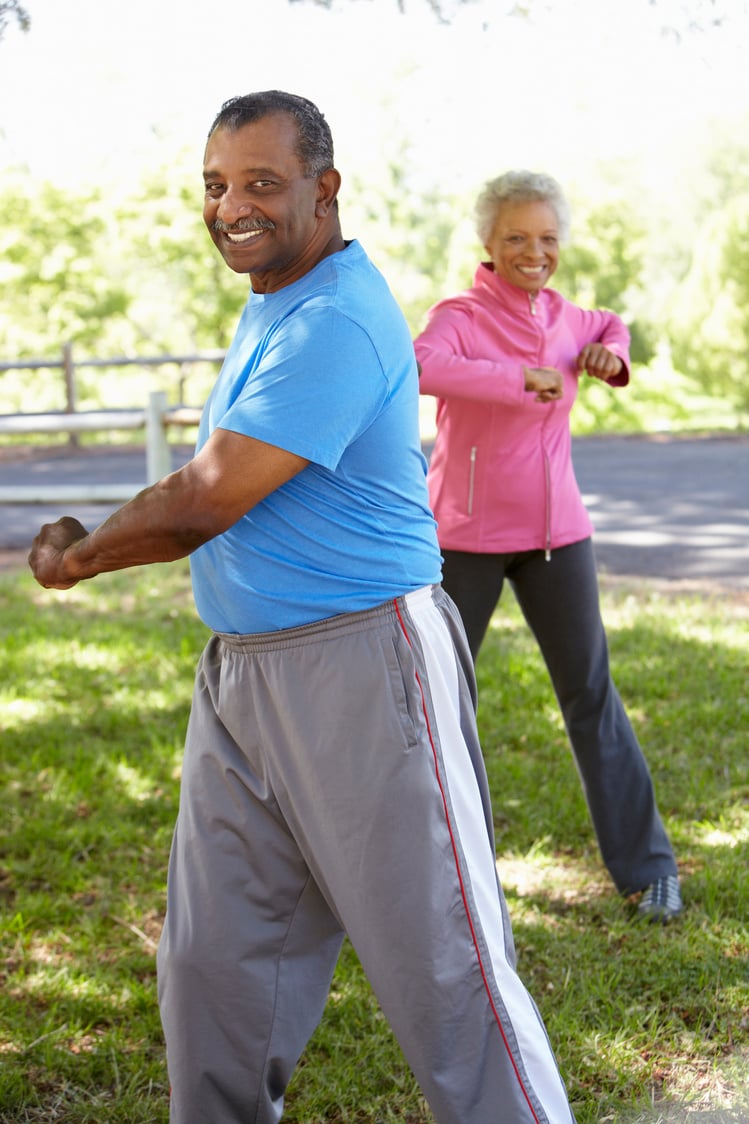 African American Couple Exercising 